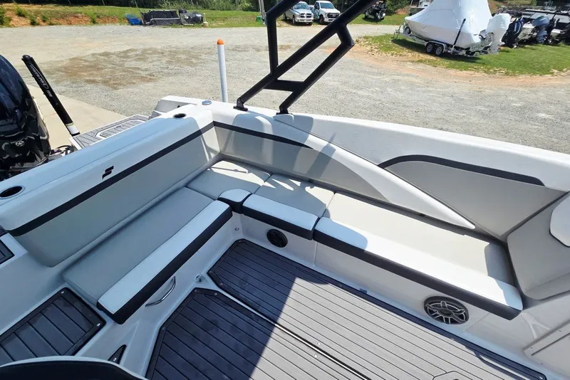 Slide: The Image of 2024 Starcraft SVX 231 OB boat interior with sleek seating and modern design. - 46