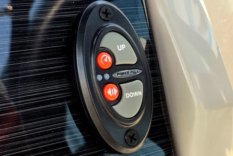 Slide: The Image of Control panel on 2024 Starcraft SVX 231 OB boat with Power-Pole buttons. - 36