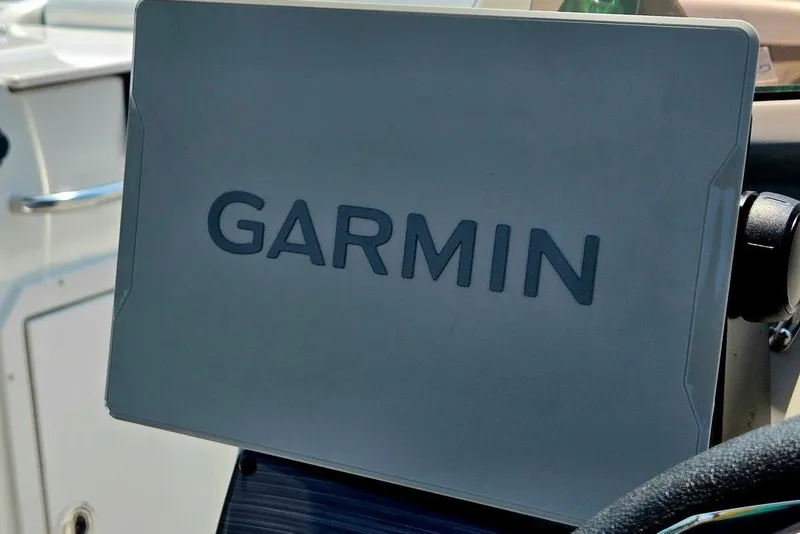 Slide: The Image of Garmin device on 2024 Starcraft SVX 231 OB boat dashboard. - 33