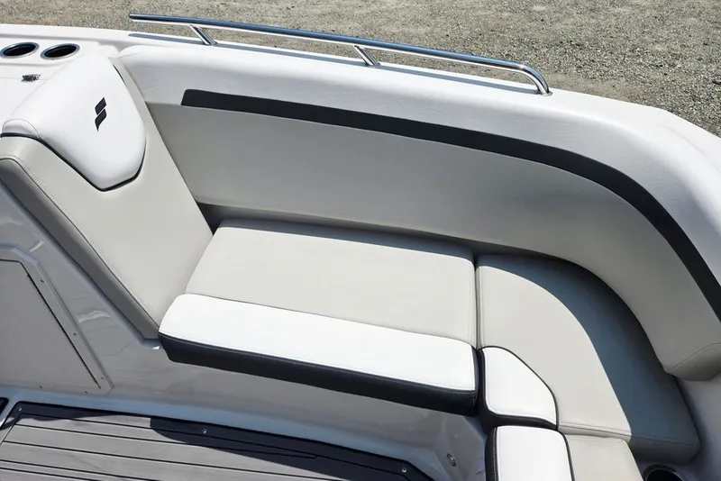 Slide: The Image of 2024 Starcraft SVX 231 OB boat interior seating with sleek design and comfortable cushions. - 22