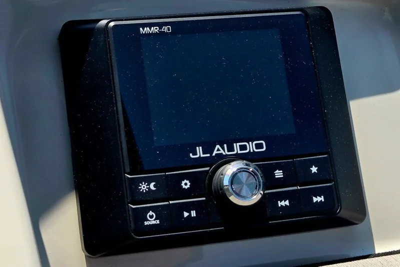 Slide: The Image of JL Audio MMR-40 control panel on 2024 Starcraft SVX 231 OB boat. - 31