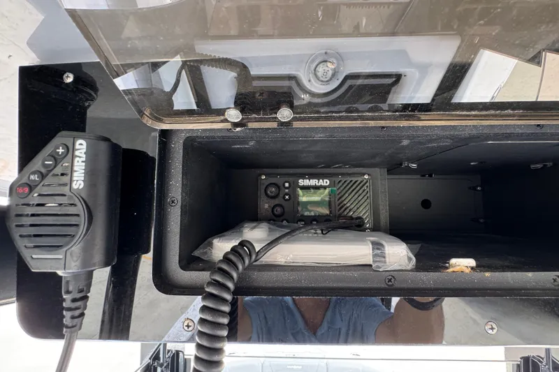 Slide: The Image of 2025 NauticStar 251 Hybrid boat console with Simrad marine electronics. - 36