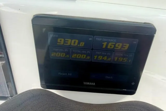 Slide: The Image of Yamaha display on 2022 Tidewater 272 CC Adventure showing trip metrics and engine hours. - 18