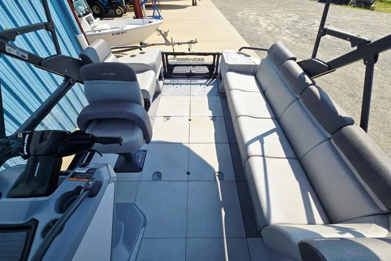 Slide: The Image of 2023 Sea-Doo Switch Cruise 21 interior with spacious seating and modern controls. - 14