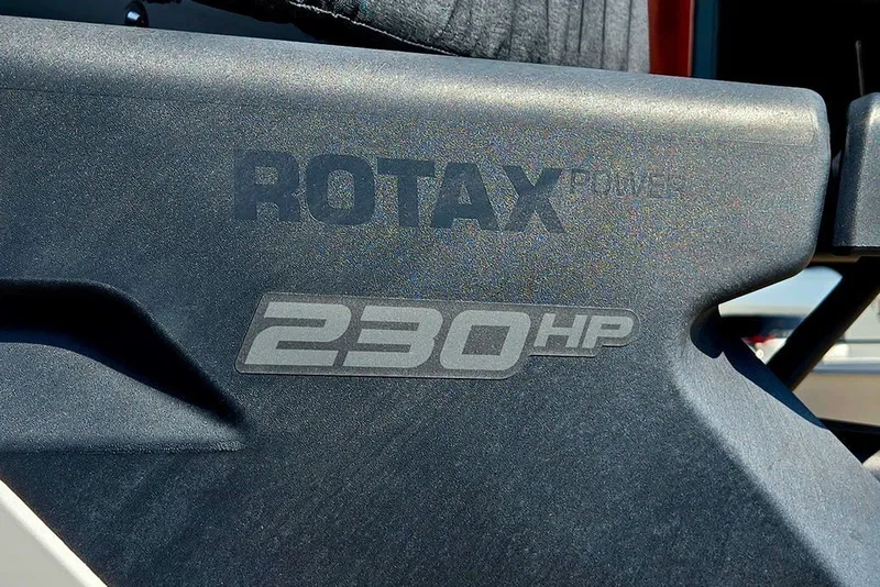 Slide: The Image of Close-up of 2023 Sea-Doo Switch Cruise 21, featuring Rotax 230 HP engine detail. - 17