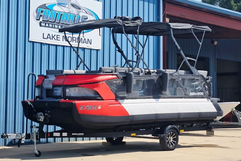 Slide: The Image of 2023 Sea-Doo Switch Cruise 21 pontoon boat on trailer at Foothills Marine. - 8