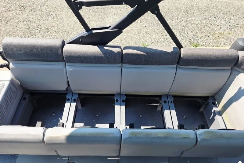 Slide: The Image of 2023 Sea-Doo Switch Cruise 21 seating area with gray upholstery and modular design. - 28