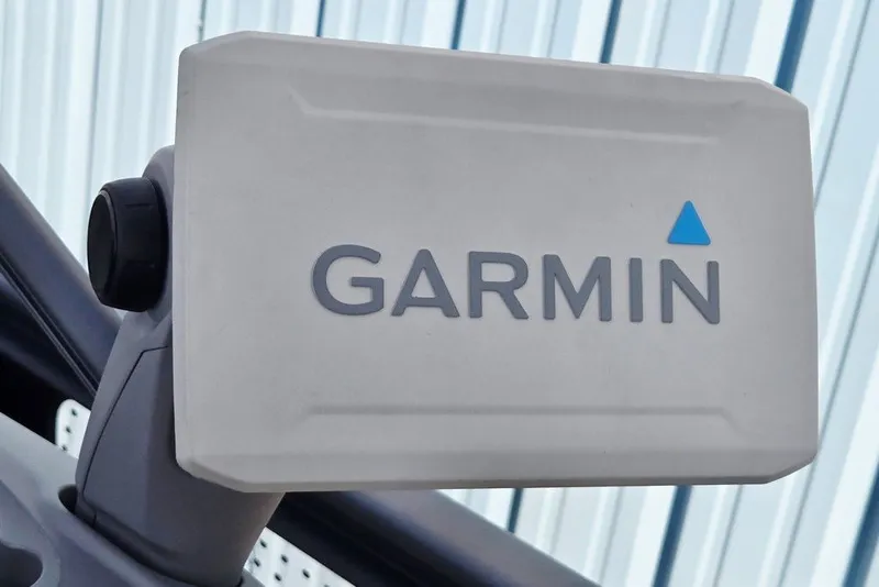 Slide: The Image of Garmin device on 2023 Sea-Doo Switch Cruise 21, mounted on a boat dashboard. - 6