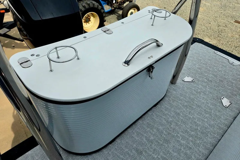 Slide: The Image of 2020 Tahoe 225 boat cooler with cup holders on deck. - 40