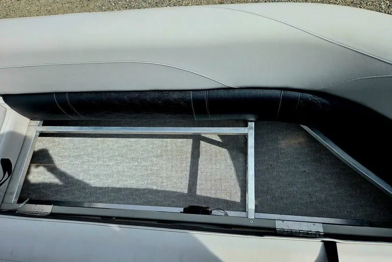 Slide: The Image of Interior view of a 2020 Tahoe 225 boat seat with storage compartment. - 15