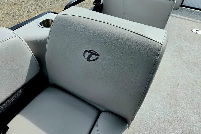 Slide: The Image of Gray seat with Tahoe logo in a 2020 Tahoe 225 boat interior. - 28