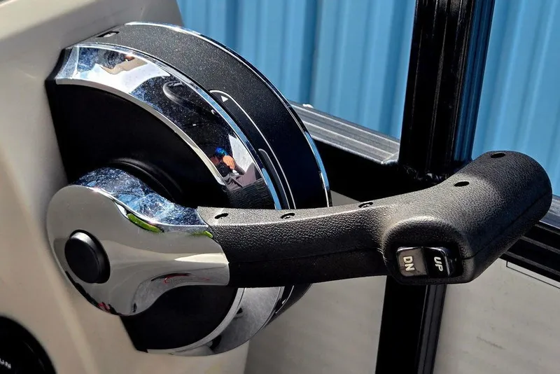 Slide: The Image of Close-up of a 2020 Tahoe 225 boat throttle control lever. - 37