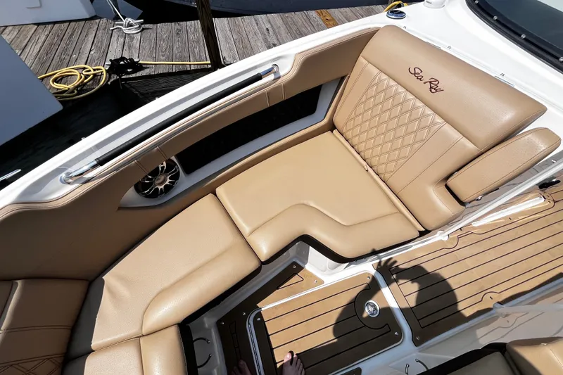 Slide: The Image of Luxurious seating on 2020 Sea Ray SLX 280 boat with tan upholstery and elegant design. - 13