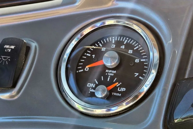 Slide: The Image of Close-up of 2018 Sun Tracker Party Barge 22 XP3 RPM gauge and trim indicator. - 29
