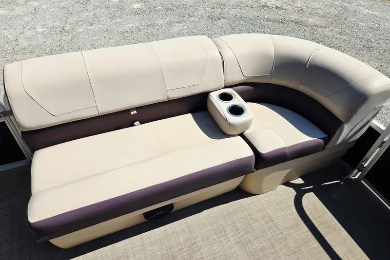 Slide: The Image of 2018 Sun Tracker Party Barge 22 XP3 seating with cup holders, beige and brown upholstery. - 20