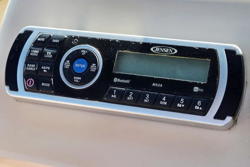 Slide: The Image of Jensen MS2A stereo system on 2018 Sun Tracker Party Barge 22 XP3 boat dashboard. - 24
