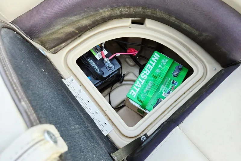 Slide: The Image of 2018 Sun Tracker Party Barge 22 XP3 battery compartment with Interstate battery visible. - 44