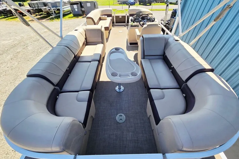 Slide: The Image of 2018 Sun Tracker Party Barge 22 XP3 interior with spacious seating and central table. - 42