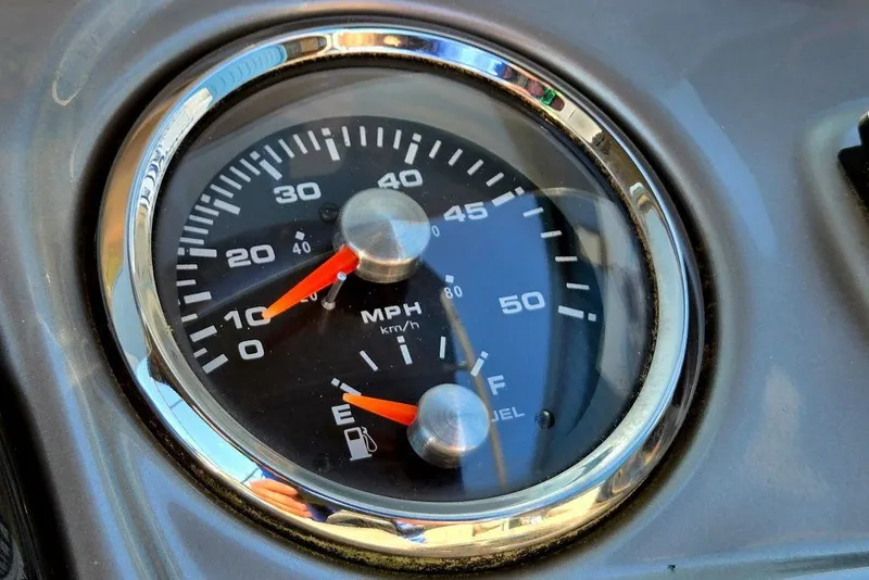 Slide: The Image of Close-up of a 2018 Sun Tracker Party Barge 22 XP3 speedometer and fuel gauge. - 25