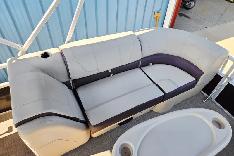 Slide: The Image of 2018 Sun Tracker Party Barge 22 XP3 pontoon boat seating with cup holders and table. - 45
