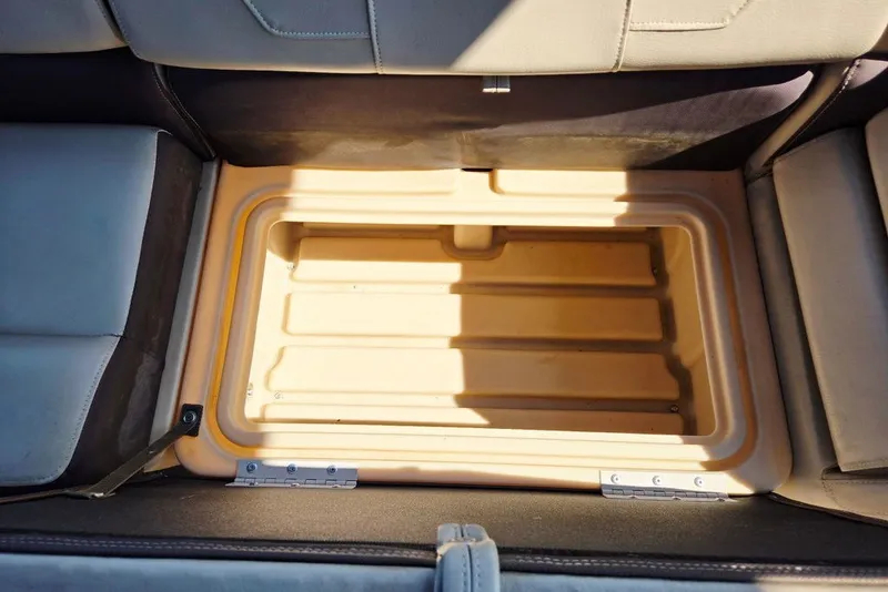 Slide: The Image of Storage compartment in 2018 Sun Tracker Party Barge 22 XP3 boat, open and empty. - 36