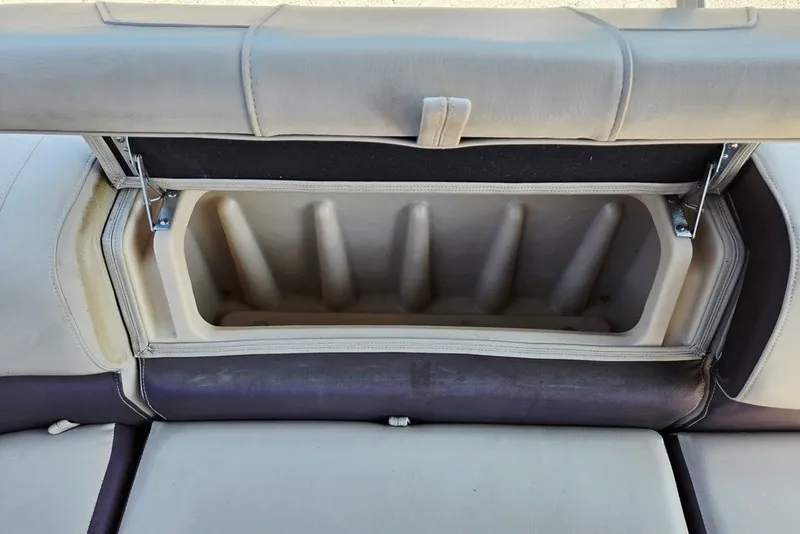 Slide: The Image of Open storage compartment on 2018 Sun Tracker Party Barge 22 XP3 boat seat. - 38