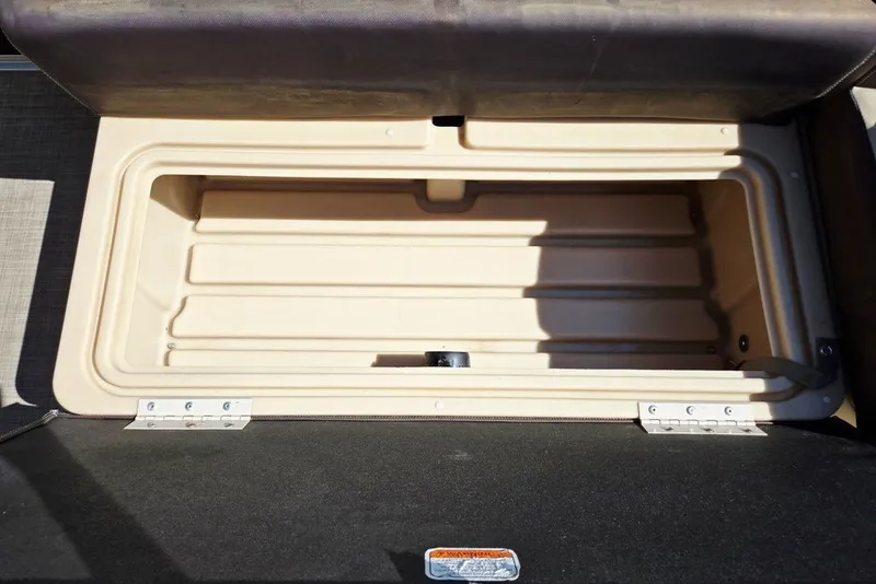Slide: The Image of Open storage compartment on a 2018 Sun Tracker Party Barge 22 XP3 boat. - 14