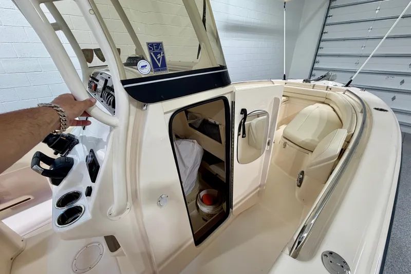 Slide: The Image of 2023 Grady-White Fisherman 257 boat interior with helm and seating area. - 25