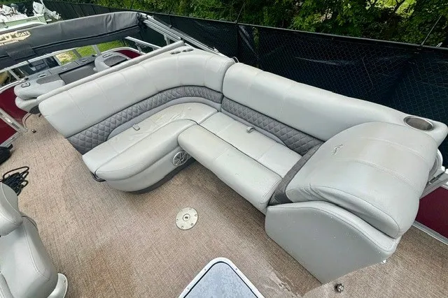 Slide: The Image of Luxurious seating on 2023 Ranger 223F boat with plush gray upholstery. - 12