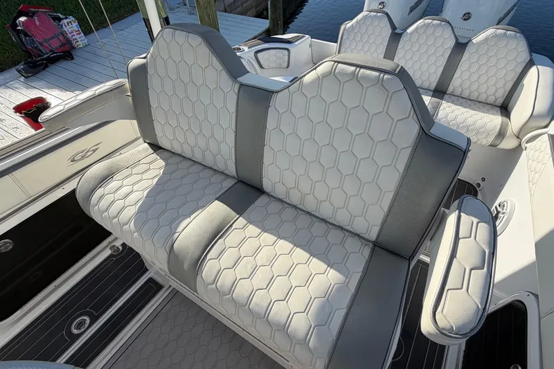 Slide: The Image of 2022 Glasstream 328 Pro-XS boat seating with hexagonal pattern upholstery. - 17