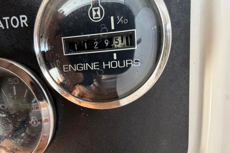 Slide: The Image of Close-up of engine hour meter showing 1295.1 hours on a 2001 Sea Ray Sundancer 510. - 53