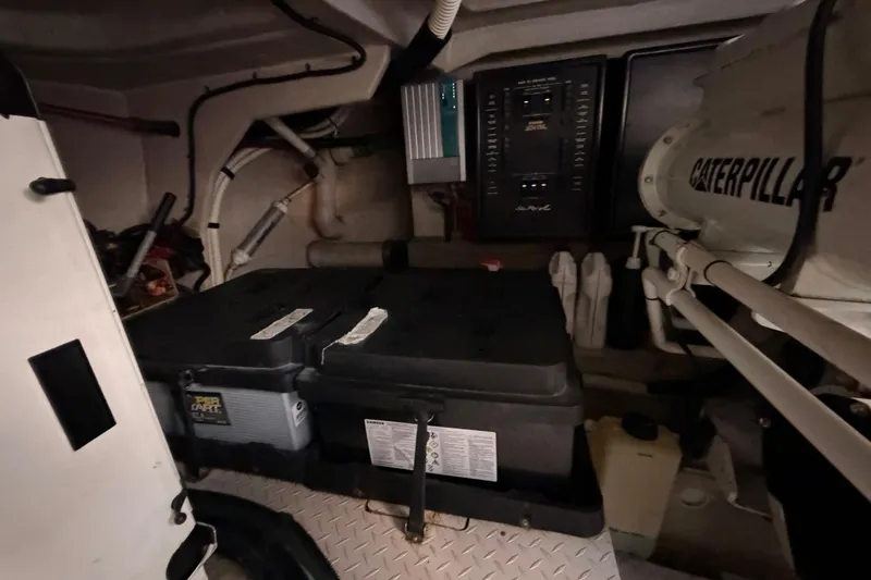 Slide: The Image of Engine room of 2001 Sea Ray Sundancer 510 with Caterpillar engine components. - 50