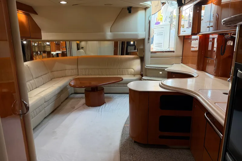 Slide: The Image of Luxurious interior of a 2001 Sea Ray Sundancer 510 yacht with elegant seating and cabinetry. - 21