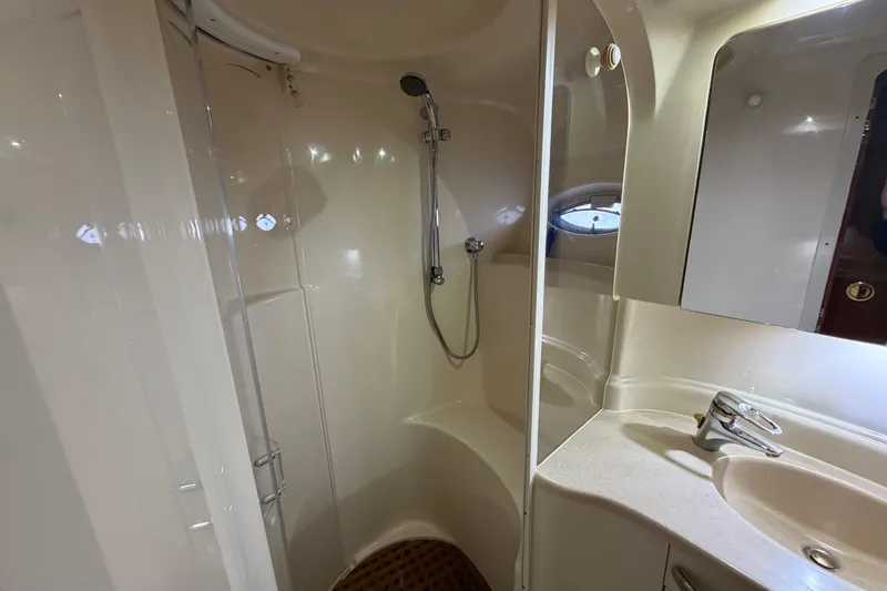 Slide: The Image of Bathroom interior of 2001 Sea Ray Sundancer 510 yacht, featuring shower and sink. - 34