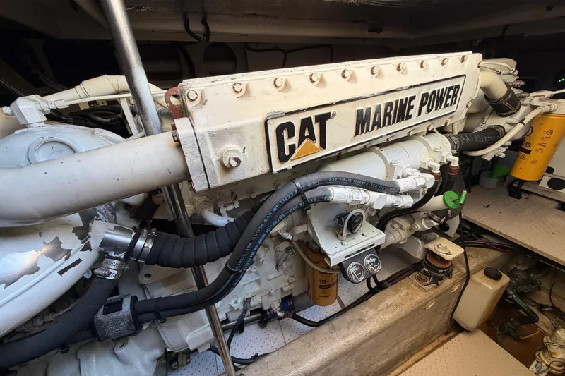 Slide: The Image of Engine room of 2001 Sea Ray Sundancer 510 with CAT Marine Power engine. - 42