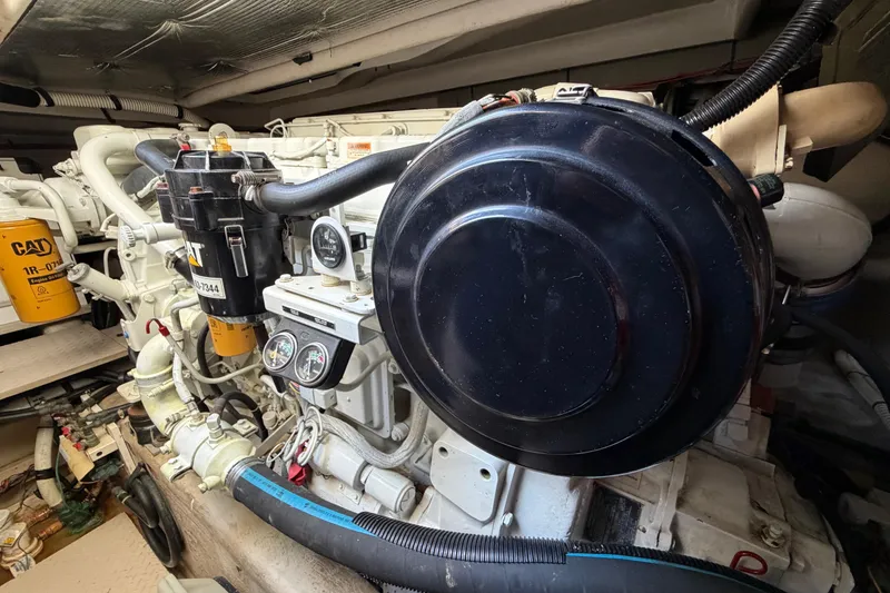 Slide: The Image of Engine room of 2001 Sea Ray Sundancer 510 with CAT components and gauges. - 47