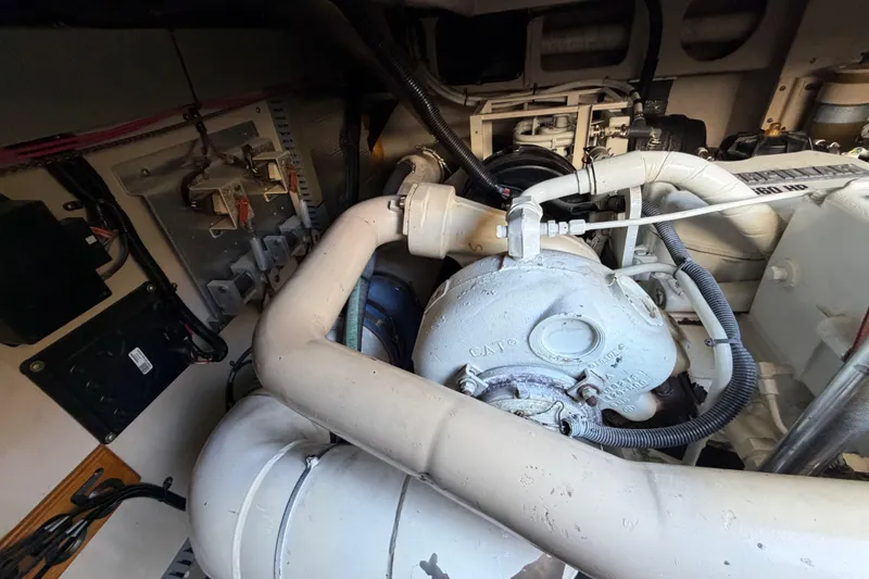 Slide: The Image of Engine room of a 2001 Sea Ray Sundancer 510 yacht, showcasing mechanical components. - 46