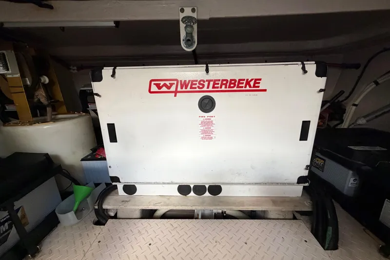 Slide: The Image of Westerbeke generator in a 2001 Sea Ray Sundancer 510 engine room. - 52