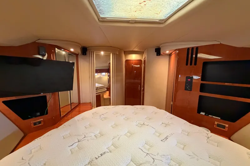 Slide: The Image of Luxurious interior of 2001 Sea Ray Sundancer 510 yacht cabin with modern amenities. - 32