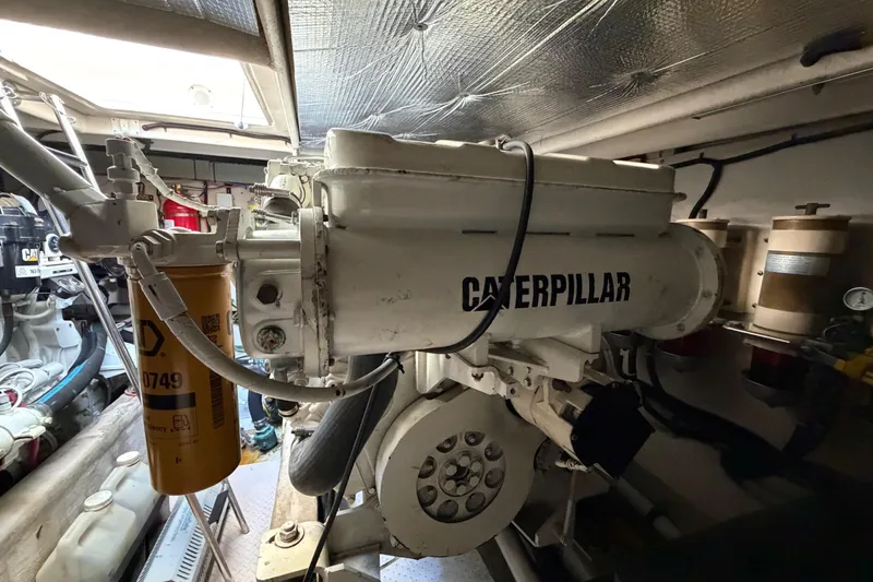 Slide: The Image of Engine room of a 2001 Sea Ray Sundancer 510 with Caterpillar machinery. - 45