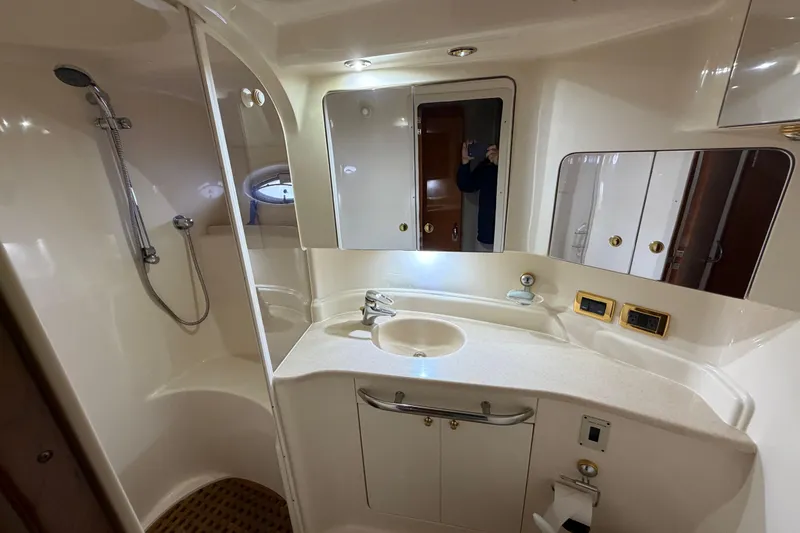 Slide: The Image of Luxurious bathroom in 2001 Sea Ray Sundancer 510 yacht with shower and vanity. - 33