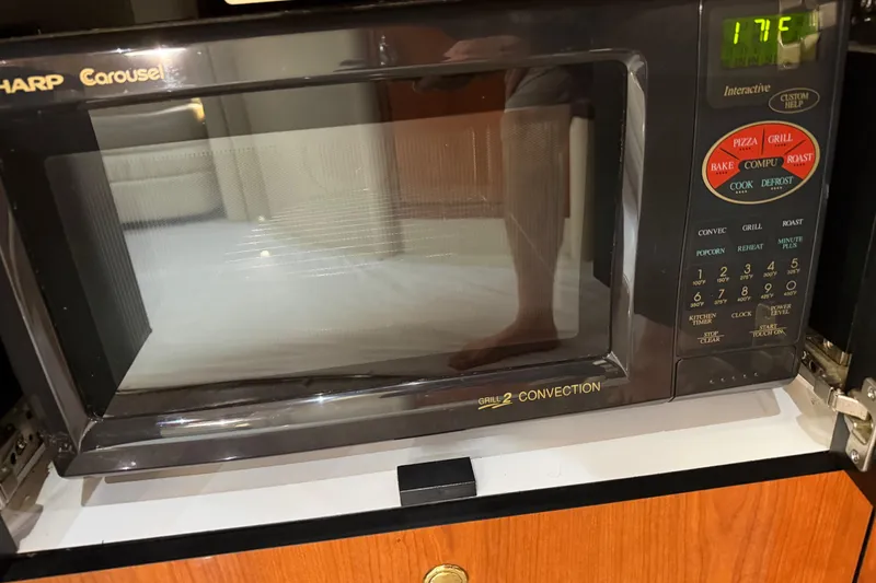 Slide: The Image of Sharp Carousel microwave in a 2001 Sea Ray Sundancer 510 yacht kitchen. - 28