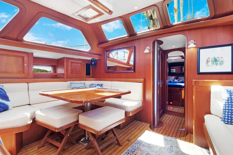 Slide: The Image of Luxurious interior of a 2009 Hylas 54 yacht with elegant wood finish and plush seating. - 7