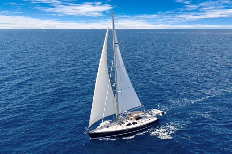 Slide: The Image of Sailing yacht Hylas 54 (2009) gliding on open ocean under clear blue skies. - 5