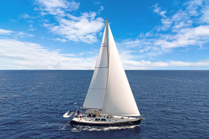 The Image of Sailing yacht Hylas 54 (2009) gliding on open ocean under clear blue skies. - 1