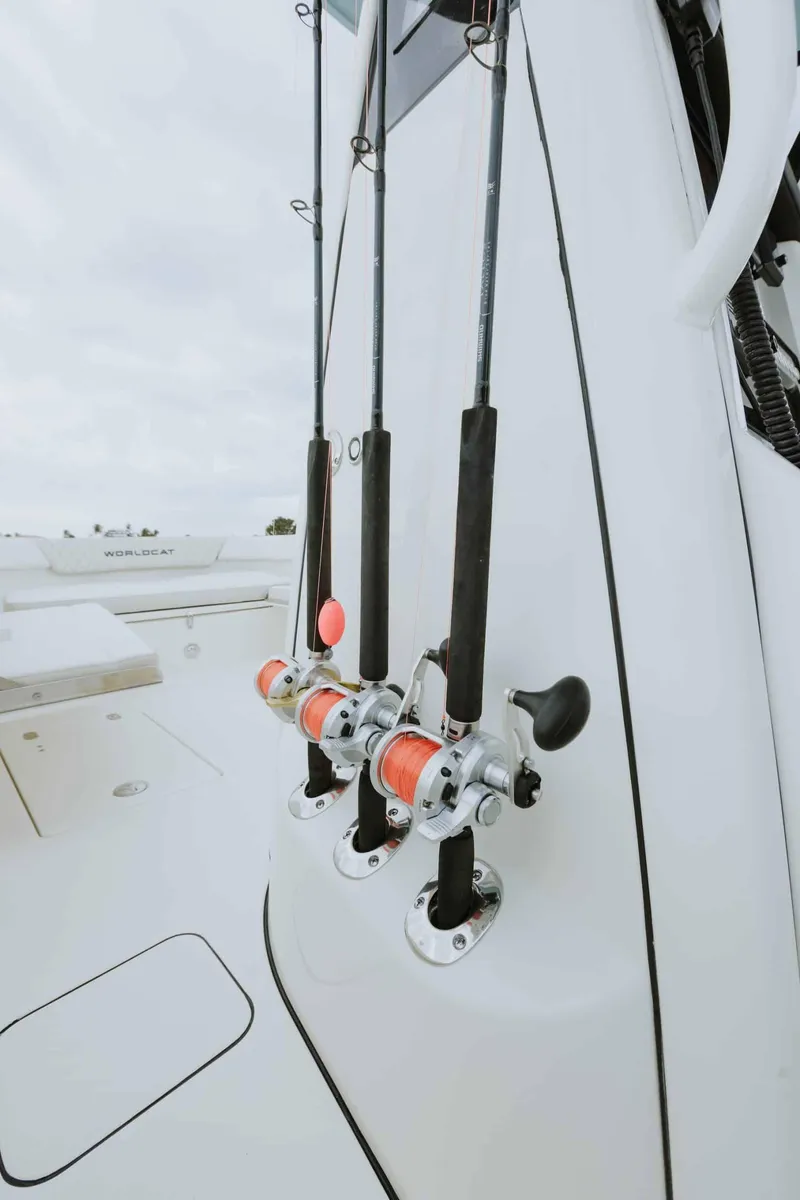 Slide: The Image of Fishing rods mounted on a 2026 World Cat 235TE boat, ready for action. - 36