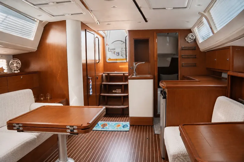 Slide: The Image of Interior of 2015 Bavaria Vision 46 yacht with wooden furnishings and modern amenities. - 18