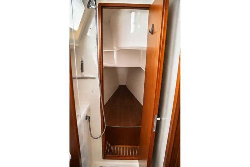 Slide: The Image of Interior view of 2015 Bavaria Vision 46 sailboat cabin with wooden finish. - 29
