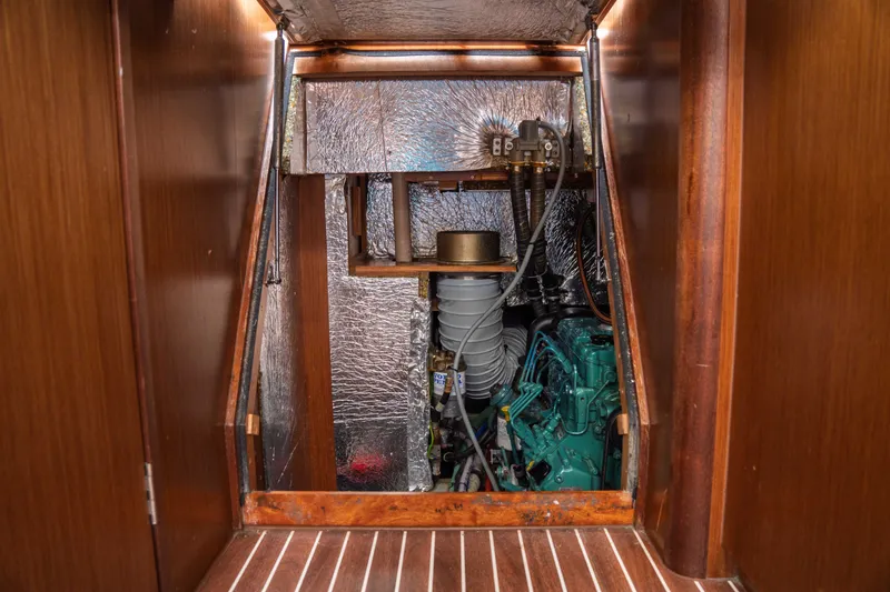 Slide: The Image of Engine compartment of 2015 Bavaria Vision 46 yacht, featuring mechanical components and insulation. - 37
