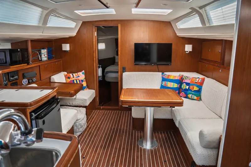 Slide: The Image of Interior of 2015 Bavaria Vision 46 yacht with cozy seating and colorful cushions. - 17